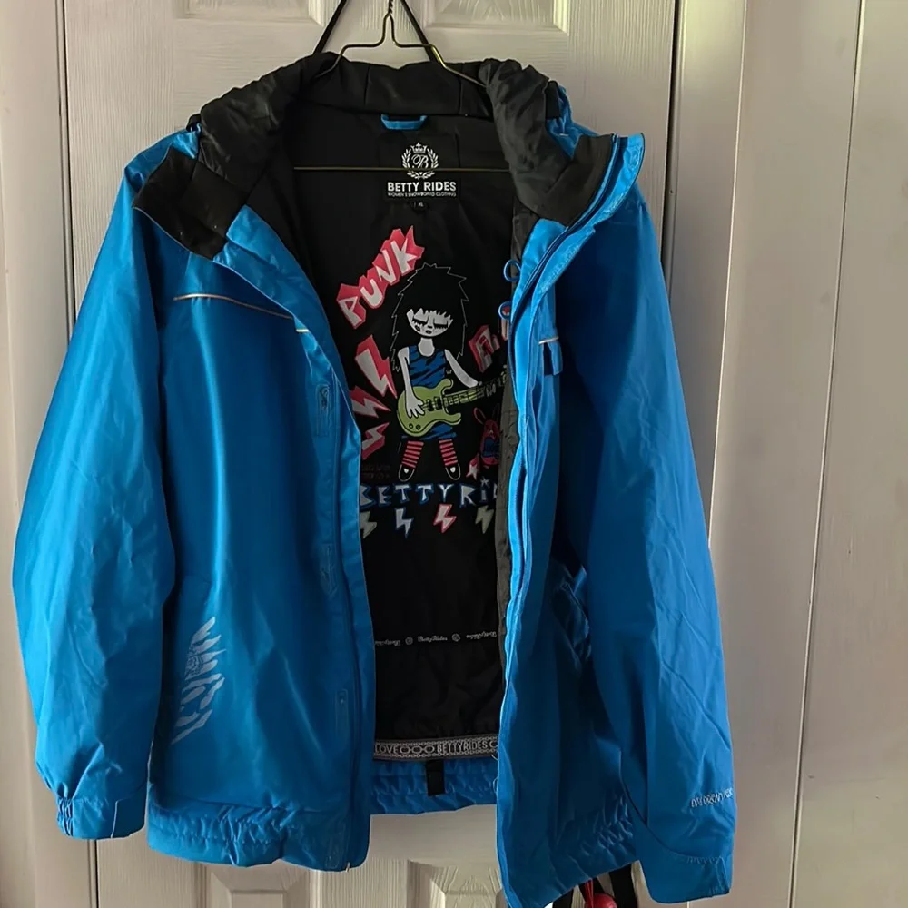 Betty Rides Blue Jacket - Picture 1 of 3